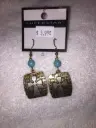 Burnished metal deco bible letter cross earrings. Color gold/turquoise