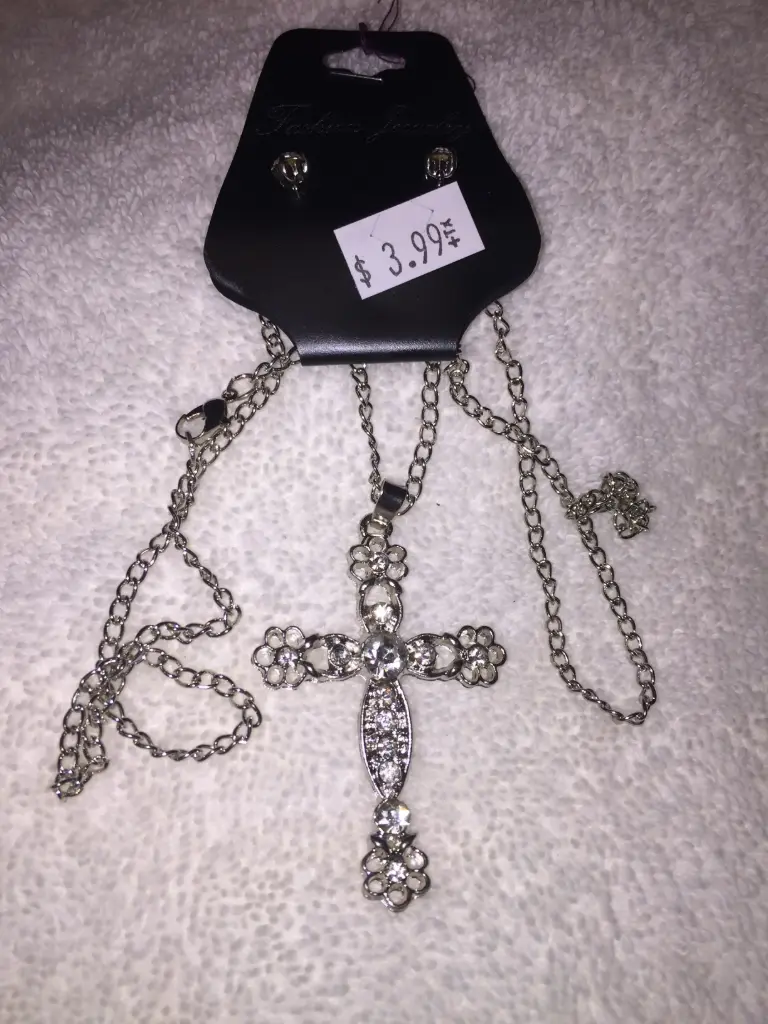 Gold and silver metal base deco stone cross necklace. Color Silver